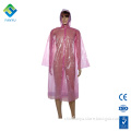 womens pink ladies in plastic raincoats